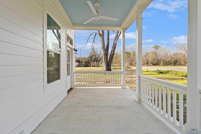 view of patio featuring ceiling fan