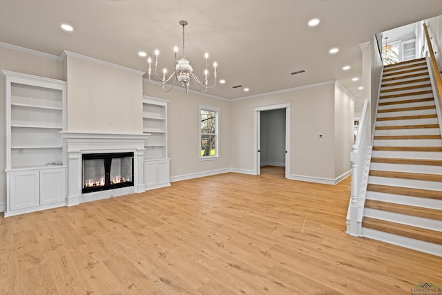 unfurnished living room featuring an inviting chandelier, ornamental molding, and light hardwood / wood-style floors