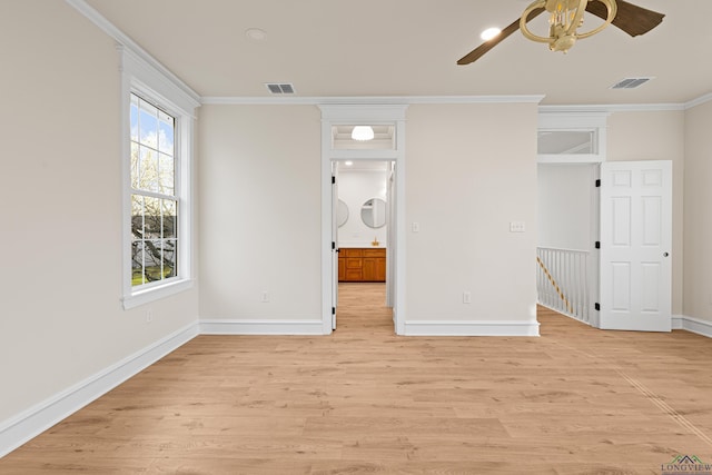 unfurnished bedroom featuring ornamental molding, light hardwood / wood-style floors, and ceiling fan