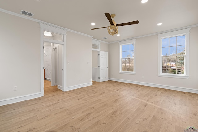 unfurnished bedroom with ornamental molding, ceiling fan, and light wood-type flooring