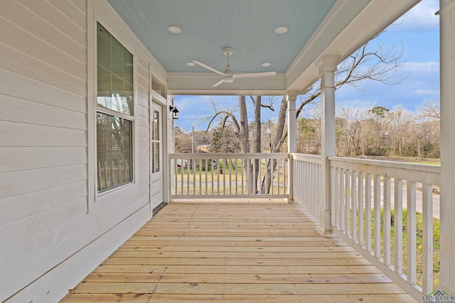 wooden terrace with ceiling fan