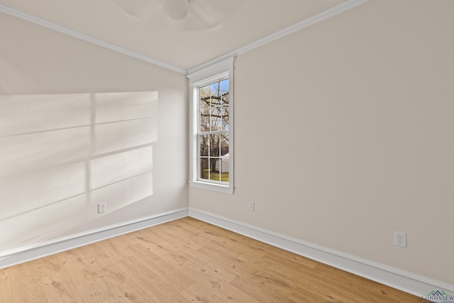 unfurnished room with wood-type flooring and crown molding