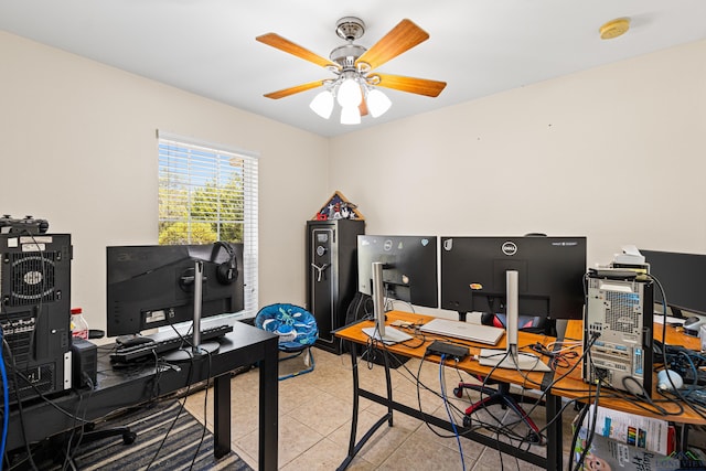 office with light tile patterned floors and ceiling fan