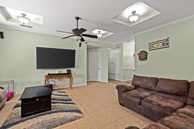 tiled living room featuring ceiling fan and ornamental molding