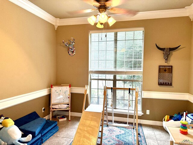 tiled bedroom with baseboards and ornamental molding