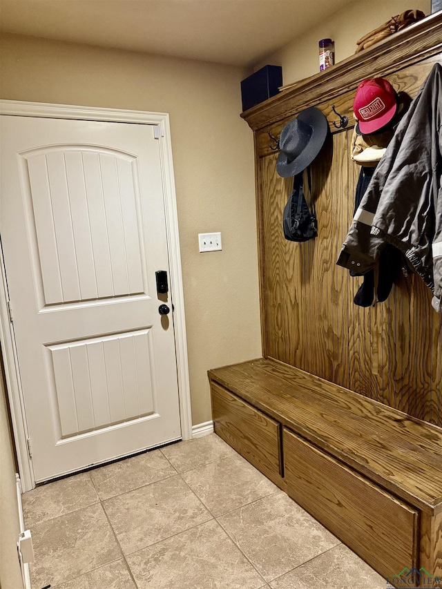 mudroom with light tile patterned floors