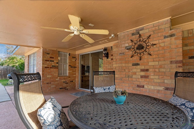 view of patio featuring ceiling fan