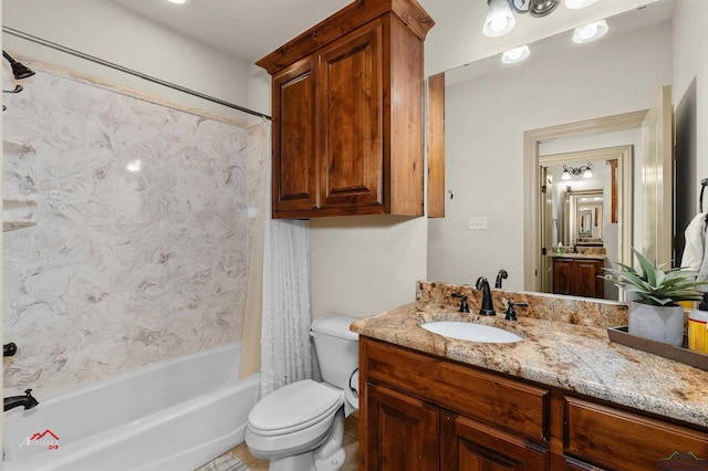 full bathroom featuring shower / bath combo with shower curtain, vanity, and toilet