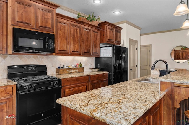 kitchen featuring a center island, backsplash, black appliances, sink, and ornamental molding