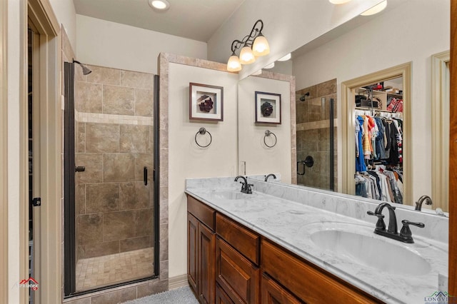 bathroom with vanity and walk in shower