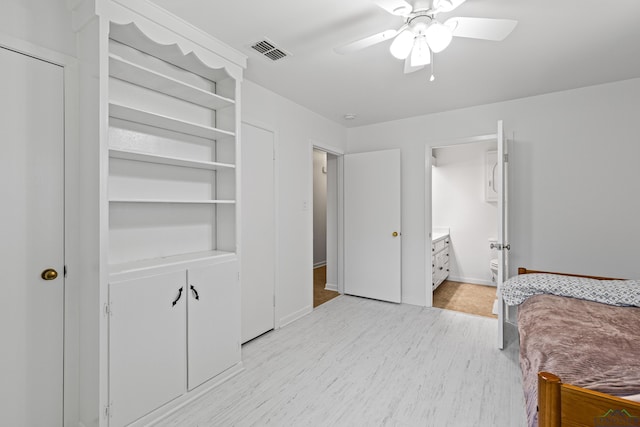 bedroom with ceiling fan and ensuite bathroom