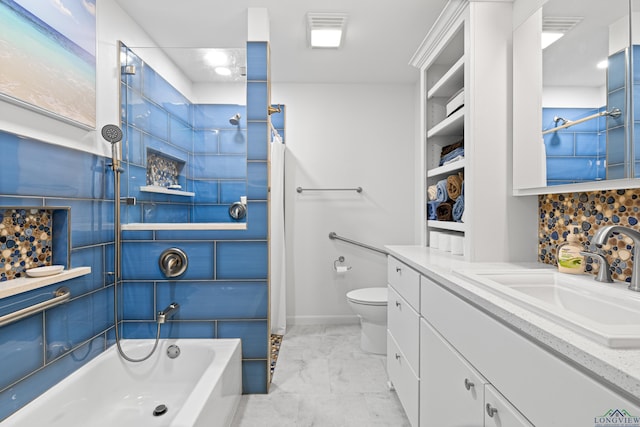 full bathroom with tiled shower / bath combo, toilet, backsplash, and vanity