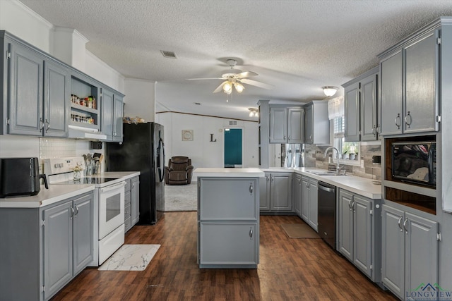 kitchen with electric stove, gray cabinets, a center island, decorative backsplash, and sink