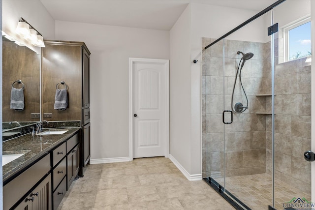 bathroom with vanity and walk in shower