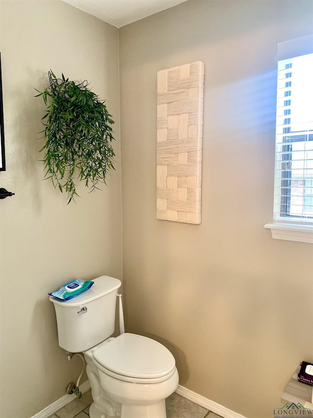 4401 Leland St, Marshall, TX 75672 - bathroom with toilet and tile patterned flooring