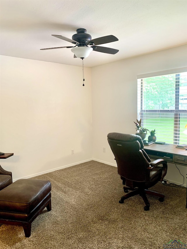 4401 Leland St, Marshall, TX 75672 - carpeted home office with a ceiling fan and baseboards