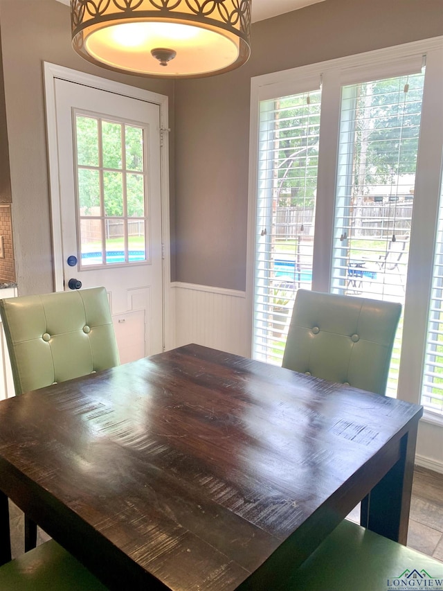 4401 Leland St, Marshall, TX 75672 - dining room featuring plenty of natural light and a wainscoted wall