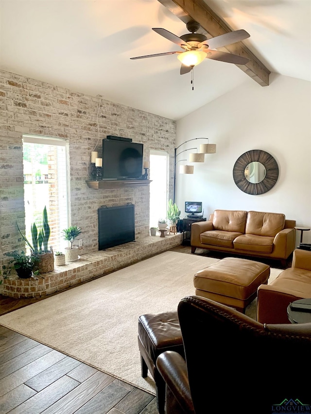 4401 Leland St, Marshall, TX 75672 - living room featuring wood-type flooring, a ceiling fan, and a fireplace