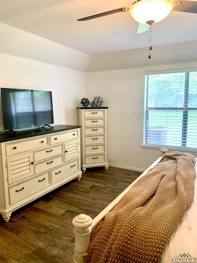 4401 Leland St, Marshall, TX 75672 - bedroom with dark wood-type flooring, vaulted ceiling, and ceiling fan