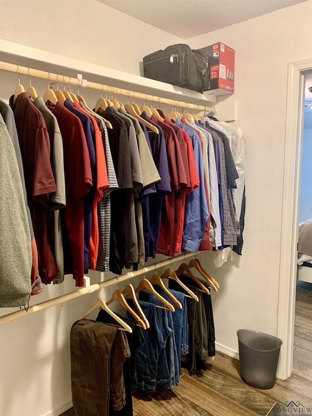4401 Leland St, Marshall, TX 75672 - walk in closet featuring wood finished floors