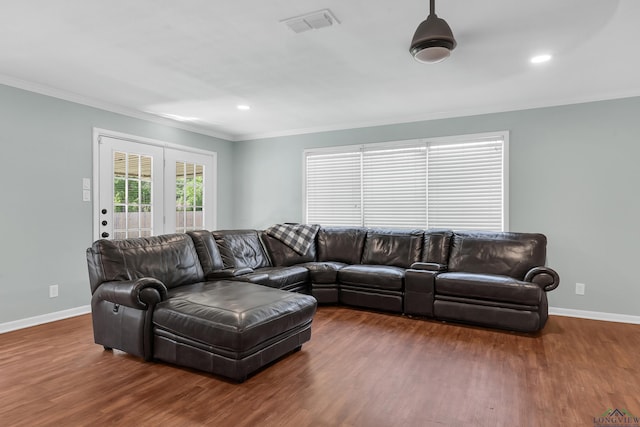 living area with crown molding, baseboards, wood finished floors, and recessed lighting