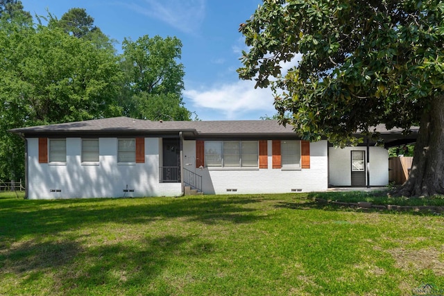 single story home with crawl space, brick siding, and a front yard