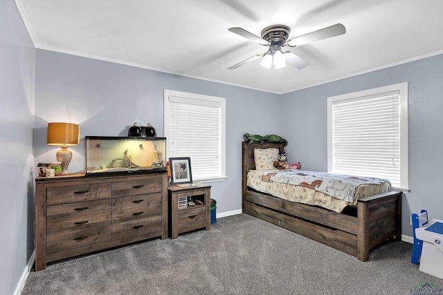 carpeted bedroom featuring crown molding, baseboards, and a ceiling fan