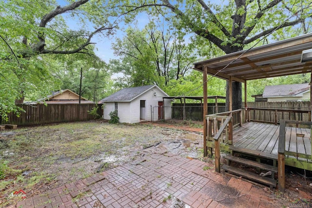 exterior space featuring an outbuilding and a deck