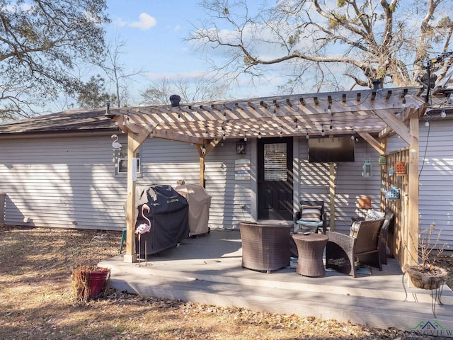 back of house with a wooden deck and a pergola