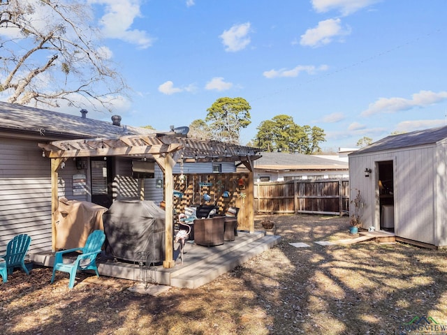 view of yard featuring a storage shed and a pergola