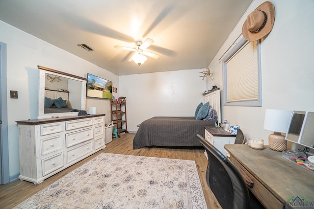 bedroom featuring ceiling fan and light wood-type flooring