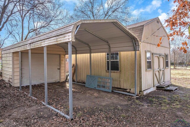 1480 Woodland Dr, Canton, TX 75103 - view of outbuilding featuring a carport