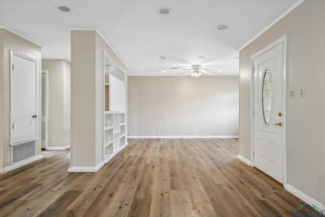 1480 Woodland Dr, Canton, TX 75103 - empty room with hardwood / wood-style flooring, ornamental molding, and ceiling fan