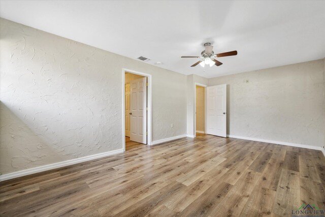 1480 Woodland Dr, Canton, TX 75103 - unfurnished bedroom featuring hardwood / wood-style flooring and ceiling fan