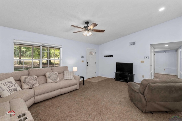 living room with carpet, ceiling fan, and vaulted ceiling