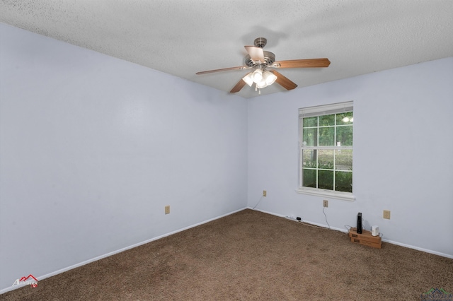 unfurnished room featuring carpet, ceiling fan, and a textured ceiling