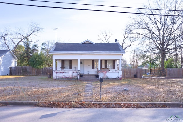 bungalow-style house featuring covered porch