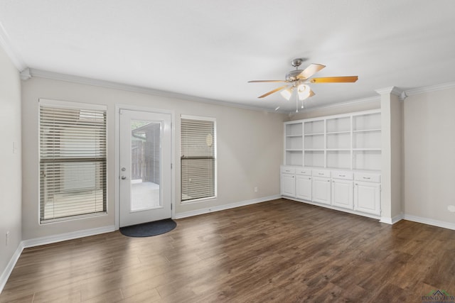 interior space with baseboards, dark wood-type flooring, and access to exterior