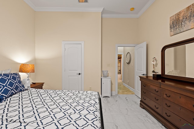 bedroom with crown molding