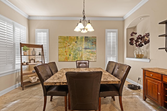 dining space featuring crown molding and a notable chandelier