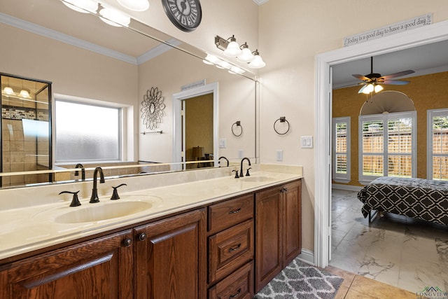 bathroom featuring vanity, ceiling fan, and crown molding