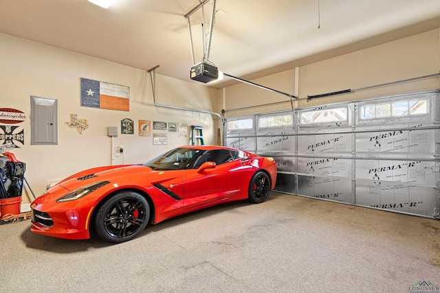 garage featuring electric panel and a garage door opener