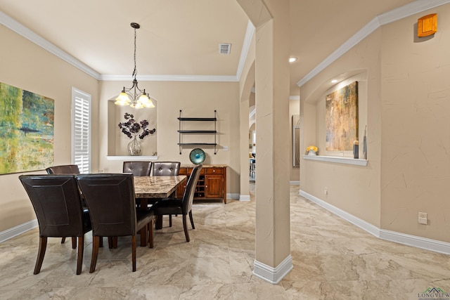 dining space with ornamental molding and a notable chandelier