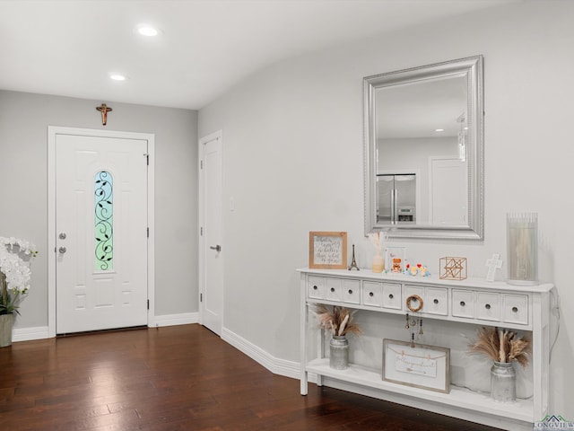 foyer featuring dark hardwood / wood-style floors