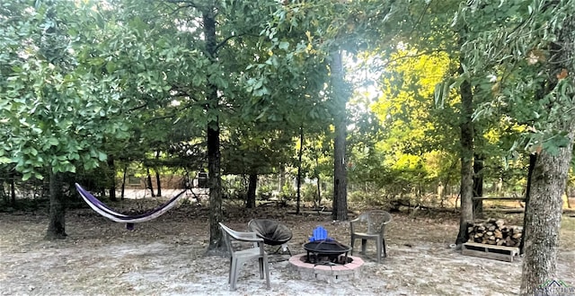 view of patio featuring a fire pit