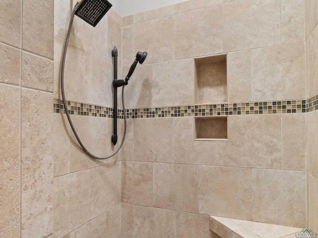 details featuring tiled shower