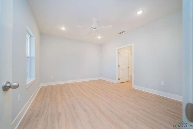 unfurnished room with light hardwood / wood-style flooring and ceiling fan