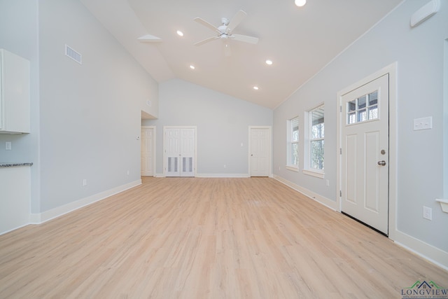 entryway featuring high vaulted ceiling, light hardwood / wood-style flooring, and ceiling fan