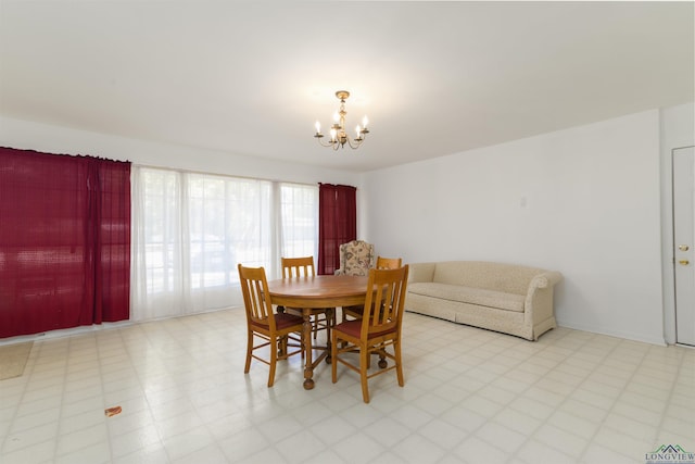 dining room featuring a notable chandelier