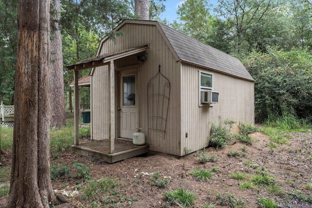 view of outbuilding featuring cooling unit